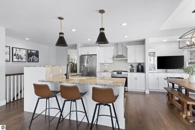 Welcome to 2764 W Crown Drive--a stunning 2022 ranch-style home on Crown Golf Course in Michigan - for sale on GolfHomes.com, golf home, golf lot