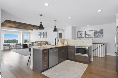 Welcome to 2764 W Crown Drive--a stunning 2022 ranch-style home on Crown Golf Course in Michigan - for sale on GolfHomes.com, golf home, golf lot