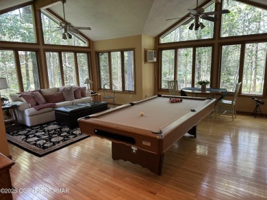 A must-see spacious home nestled in the gated Timber Trails on Lake Naomi Timber Trails Golf Club in Pennsylvania - for sale on GolfHomes.com, golf home, golf lot
