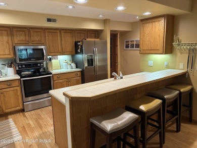 A must-see spacious home nestled in the gated Timber Trails on Lake Naomi Timber Trails Golf Club in Pennsylvania - for sale on GolfHomes.com, golf home, golf lot