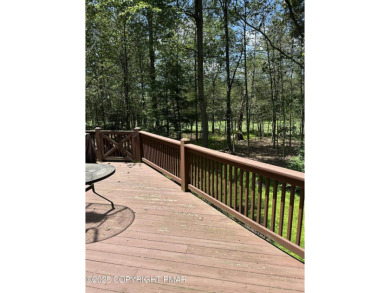 A must-see spacious home nestled in the gated Timber Trails on Lake Naomi Timber Trails Golf Club in Pennsylvania - for sale on GolfHomes.com, golf home, golf lot