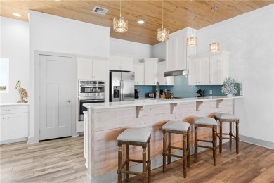 Welcome to coastal luxury living at its finest! This stunning on Palmilla Beach Golf Club in Texas - for sale on GolfHomes.com, golf home, golf lot