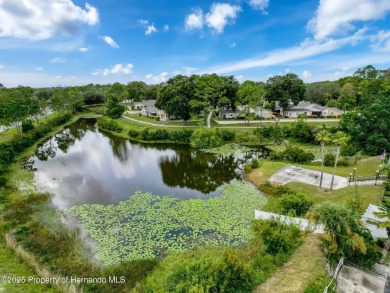 NEW PRICE IMPROVEMENT! Only 154,888. Lowest priced 2 bedroom on Heather Golf and Country Club in Florida - for sale on GolfHomes.com, golf home, golf lot