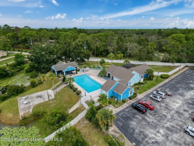 NEW PRICE IMPROVEMENT! Only 154,888. Lowest priced 2 bedroom on Heather Golf and Country Club in Florida - for sale on GolfHomes.com, golf home, golf lot
