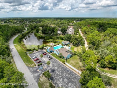 NEW PRICE IMPROVEMENT! Only 154,888. Lowest priced 2 bedroom on Heather Golf and Country Club in Florida - for sale on GolfHomes.com, golf home, golf lot