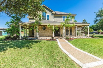 Nestled on a picturesque corner lot, this stunning traditional on The Lake Country Club - Lake Waco in Texas - for sale on GolfHomes.com, golf home, golf lot