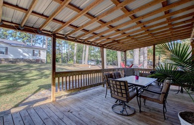Sitting on three lots.  This Immaculate 3-bedroom, 2-bath home on Mountain Ranch Golf Club in Arkansas - for sale on GolfHomes.com, golf home, golf lot