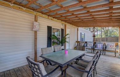 Sitting on three lots.  This Immaculate 3-bedroom, 2-bath home on Mountain Ranch Golf Club in Arkansas - for sale on GolfHomes.com, golf home, golf lot