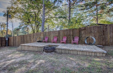 Sitting on three lots.  This Immaculate 3-bedroom, 2-bath home on Mountain Ranch Golf Club in Arkansas - for sale on GolfHomes.com, golf home, golf lot