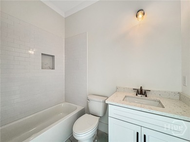 Discover easy coastal living in The Dover Bluff, a bright and on The Golf Club At Sanctuary Cove in Georgia - for sale on GolfHomes.com, golf home, golf lot