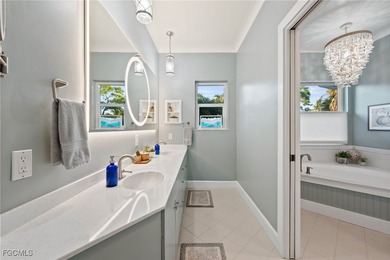 Situated in the serene heart of Bokeelia, this exquisite on Alden Pines Golf Club in Florida - for sale on GolfHomes.com, golf home, golf lot