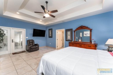 Discover comfort, style, and resort living in this custom Five on South Padre Island Golf Club in Texas - for sale on GolfHomes.com, golf home, golf lot