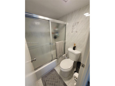 Beautiful 2/2 unit with breathtaking golf course views in a safe on Turnberry Isle Resort and Club in Florida - for sale on GolfHomes.com, golf home, golf lot