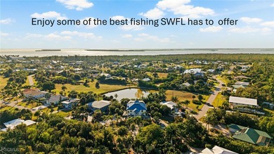 Situated in the serene heart of Bokeelia, this exquisite on Alden Pines Golf Club in Florida - for sale on GolfHomes.com, golf home, golf lot