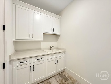 Discover easy coastal living in The Dover Bluff, a bright and on The Golf Club At Sanctuary Cove in Georgia - for sale on GolfHomes.com, golf home, golf lot