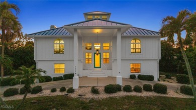 Situated in the serene heart of Bokeelia, this exquisite on Alden Pines Golf Club in Florida - for sale on GolfHomes.com, golf home, golf lot