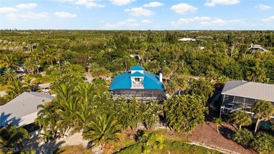 Situated in the serene heart of Bokeelia, this exquisite on Alden Pines Golf Club in Florida - for sale on GolfHomes.com, golf home, golf lot