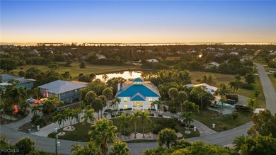 Situated in the serene heart of Bokeelia, this exquisite on Alden Pines Golf Club in Florida - for sale on GolfHomes.com, golf home, golf lot