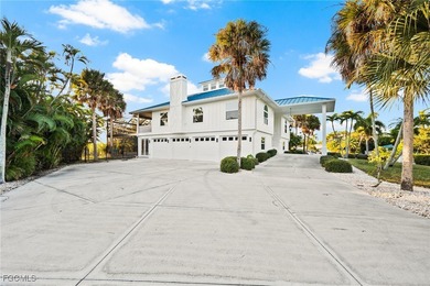 Situated in the serene heart of Bokeelia, this exquisite on Alden Pines Golf Club in Florida - for sale on GolfHomes.com, golf home, golf lot