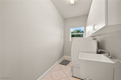 Situated in the serene heart of Bokeelia, this exquisite on Alden Pines Golf Club in Florida - for sale on GolfHomes.com, golf home, golf lot