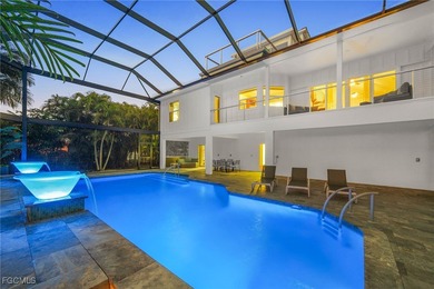 Situated in the serene heart of Bokeelia, this exquisite on Alden Pines Golf Club in Florida - for sale on GolfHomes.com, golf home, golf lot