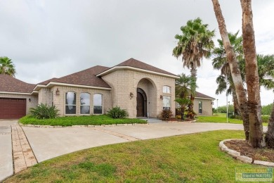 Discover comfort, style, and resort living in this custom Five on South Padre Island Golf Club in Texas - for sale on GolfHomes.com, golf home, golf lot