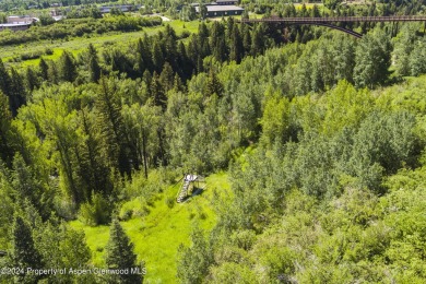 Discover Maroon Creek Lot 16, an exclusive 2.3-acre ski-in on Maroon Creek Club in Colorado - for sale on GolfHomes.com, golf home, golf lot