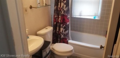 Great Starter Home or Attention Investors, Immediate Potential on The Links At Crystal Lake in Michigan - for sale on GolfHomes.com, golf home, golf lot