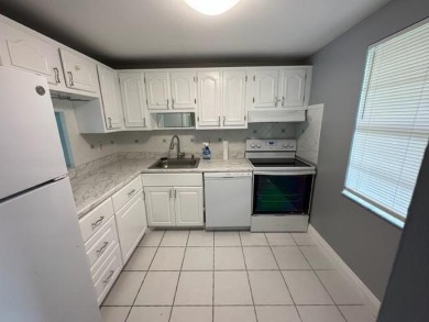 55+ COMMUNITY.UNFURNISHED, BEST LOCATION, FIRST FLOOR CORNER on Marina Lakes Golf Course in Florida - for sale on GolfHomes.com, golf home, golf lot
