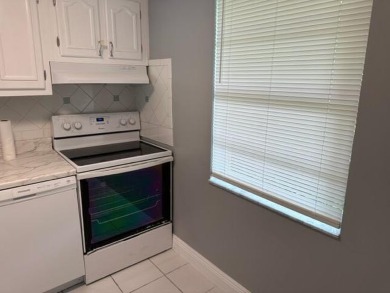 55+ COMMUNITY.UNFURNISHED, BEST LOCATION, FIRST FLOOR CORNER on Marina Lakes Golf Course in Florida - for sale on GolfHomes.com, golf home, golf lot