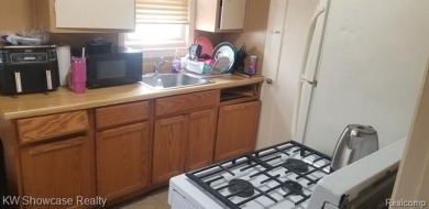 Great Starter Home or Attention Investors, Immediate Potential on The Links At Crystal Lake in Michigan - for sale on GolfHomes.com, golf home, golf lot