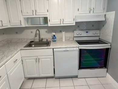 55+ COMMUNITY.UNFURNISHED, BEST LOCATION, FIRST FLOOR CORNER on Marina Lakes Golf Course in Florida - for sale on GolfHomes.com, golf home, golf lot