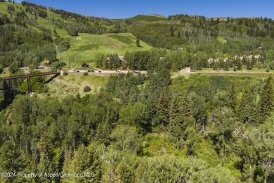 Discover Maroon Creek Lot 16, an exclusive 2.3-acre ski-in on Maroon Creek Club in Colorado - for sale on GolfHomes.com, golf home, golf lot