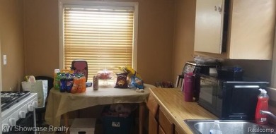 Great Starter Home or Attention Investors, Immediate Potential on The Links At Crystal Lake in Michigan - for sale on GolfHomes.com, golf home, golf lot