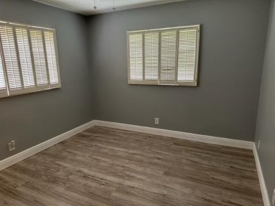 55+ COMMUNITY.UNFURNISHED, BEST LOCATION, FIRST FLOOR CORNER on Marina Lakes Golf Course in Florida - for sale on GolfHomes.com, golf home, golf lot