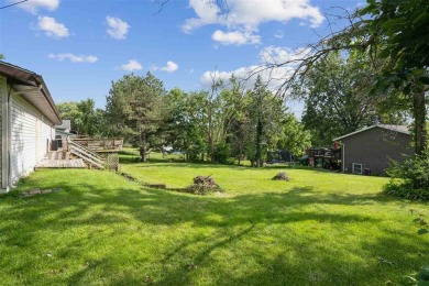 The lake area home you've been waiting for! This Twin View on Lake McBride Golf Course in Iowa - for sale on GolfHomes.com, golf home, golf lot