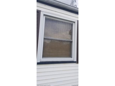 Great Starter Home or Attention Investors, Immediate Potential on The Links At Crystal Lake in Michigan - for sale on GolfHomes.com, golf home, golf lot