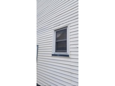 Great Starter Home or Attention Investors, Immediate Potential on The Links At Crystal Lake in Michigan - for sale on GolfHomes.com, golf home, golf lot
