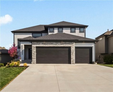 This beautiful custom-built 1.5-story home in WaterCrest Landing on Falcon Ridge Golf Course in Kansas - for sale on GolfHomes.com, golf home, golf lot