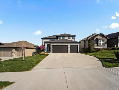 This beautiful custom-built 1.5-story home in WaterCrest Landing on Falcon Ridge Golf Course in Kansas - for sale on GolfHomes.com, golf home, golf lot