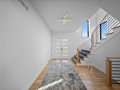 This beautiful custom-built 1.5-story home in WaterCrest Landing on Falcon Ridge Golf Course in Kansas - for sale on GolfHomes.com, golf home, golf lot