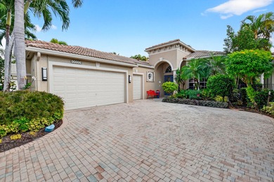 This magnificent tropical paradise, Chatam model home is located on Wycliffe Golf and Country Club in Florida - for sale on GolfHomes.com, golf home, golf lot