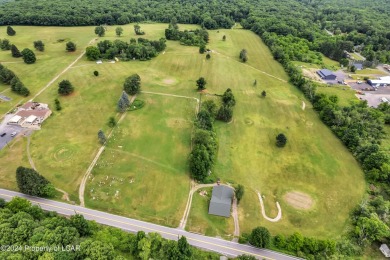 This spectacular property situated on 86 ACRES features a 9 hole on Morgan Hills in Pennsylvania - for sale on GolfHomes.com, golf home, golf lot