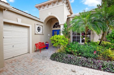 This magnificent tropical paradise, Chatam model home is located on Wycliffe Golf and Country Club in Florida - for sale on GolfHomes.com, golf home, golf lot