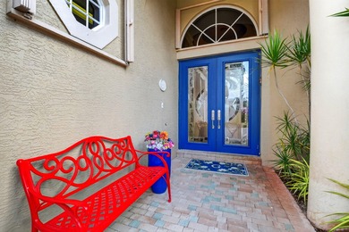 This magnificent tropical paradise, Chatam model home is located on Wycliffe Golf and Country Club in Florida - for sale on GolfHomes.com, golf home, golf lot