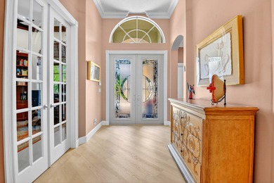 This magnificent tropical paradise, Chatam model home is located on Wycliffe Golf and Country Club in Florida - for sale on GolfHomes.com, golf home, golf lot