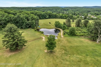 This spectacular property situated on 86 ACRES features a 9 hole on Morgan Hills in Pennsylvania - for sale on GolfHomes.com, golf home, golf lot