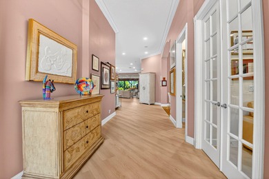 This magnificent tropical paradise, Chatam model home is located on Wycliffe Golf and Country Club in Florida - for sale on GolfHomes.com, golf home, golf lot