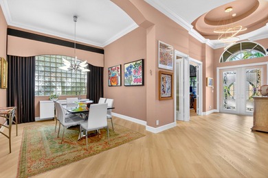 This magnificent tropical paradise, Chatam model home is located on Wycliffe Golf and Country Club in Florida - for sale on GolfHomes.com, golf home, golf lot