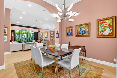 This magnificent tropical paradise, Chatam model home is located on Wycliffe Golf and Country Club in Florida - for sale on GolfHomes.com, golf home, golf lot